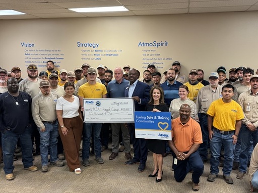 IMG_0974 Atmos Staff present donation to Harold Yo